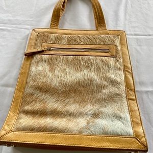 PRE OWNED. VINTAGE. Hare + Hart Crawford